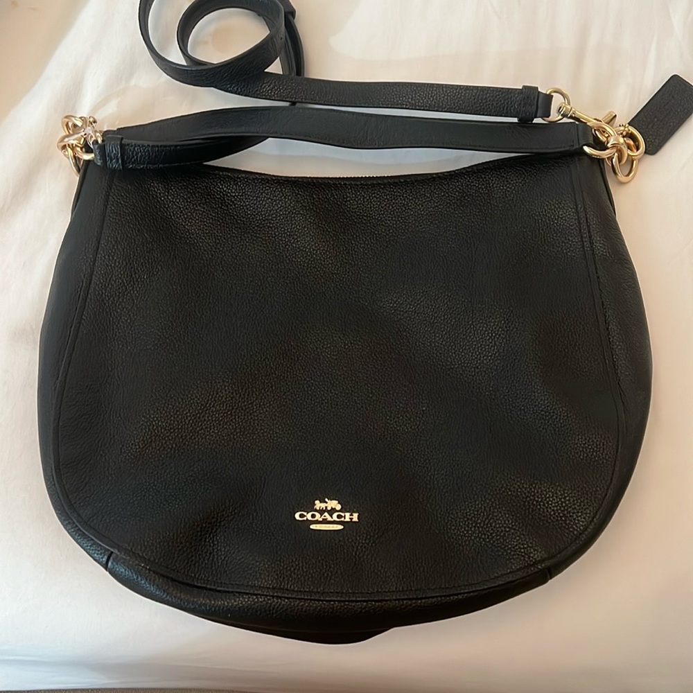 Coach black purse never used